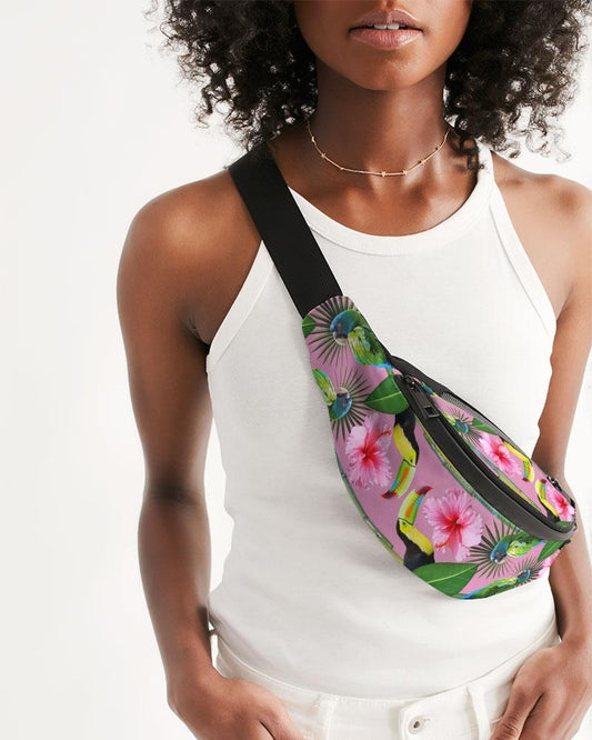 Everyone needs a small stylish bag that doesn't get in your way and secures all your gear. Our Safari Printed Crossbody Sling Bag can be worn over the shoulder or around the waist for easy access. With two zip compartments, an adjustable belt, and a buckle closure, who needs pockets? This colorful exotic print comes in blue, green, and pink.