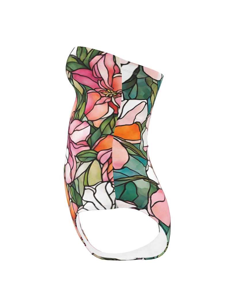 Illuminate your surroundings with the Blooming Bright print. Inspired by the transformative beauty of stained-glass, this design features vibrant azaleas and hibiscus flowers in shades of pink, orange, and white, surrounded by lush green leaves. Each element showcases the power of transformation, ensuring you radiate confidence and elegance wherever you go.