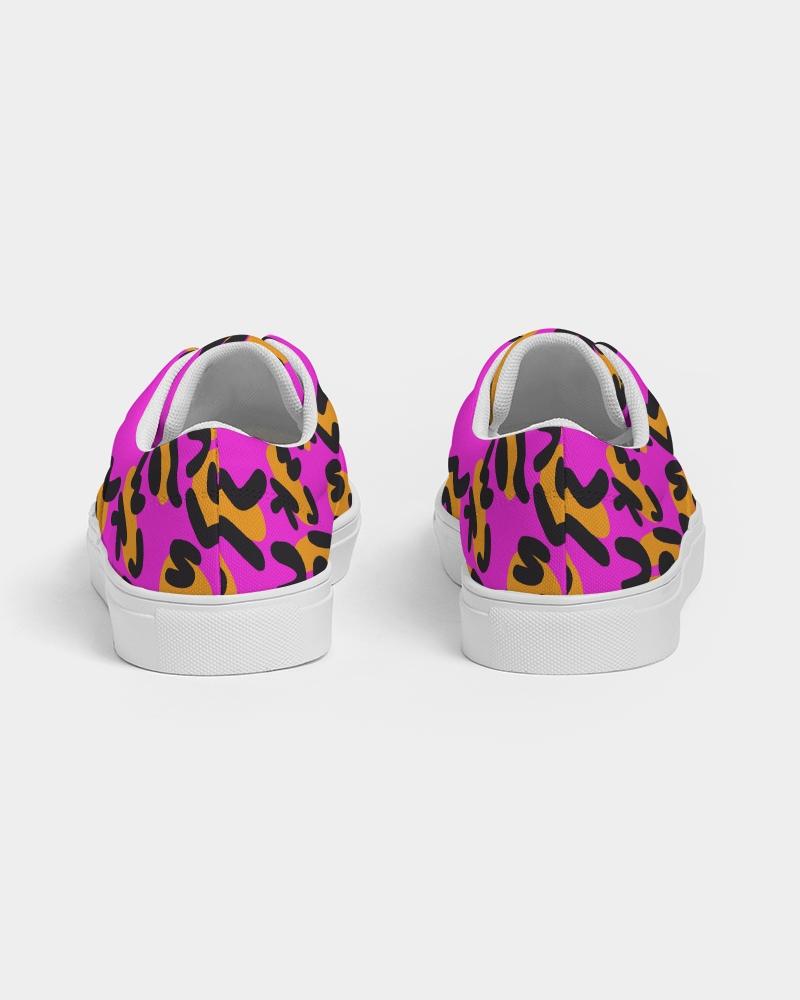 This print was created by using the letters in "Alias Unknown" to create abstract spots similar to a cheetah then placed on different background colors. These bright two-tone designs are the perfect combination of casual and classy.