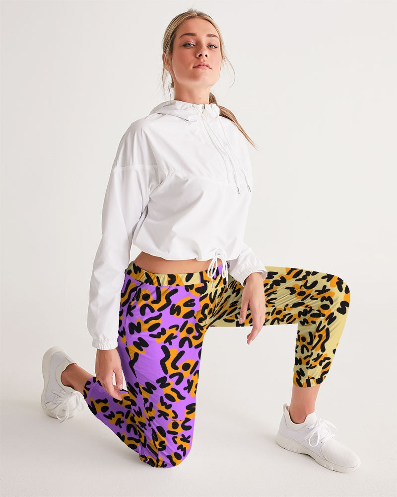 Our Track Pants are both lightweight and versatile. The water-resistant fabric keeps you dry and comfortable so you can get active with ease. With a relaxed fit and mid-rise waist, it's the perfect pants for a "casual" fashion statement.