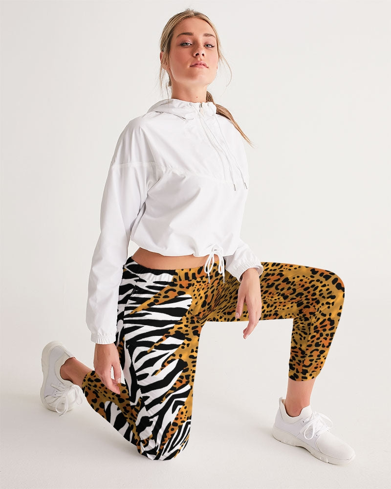 Our Track Pants are both lightweight and versatile. The water-resistant fabric keeps you dry and comfortable so you can get active with ease. With a relaxed fit and mid-rise waist, it's the perfect pants for a "casual" fashion statement.